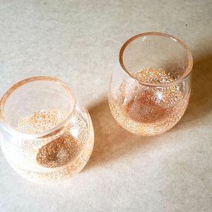 Thick, heavy duty stem less drinking glasses.